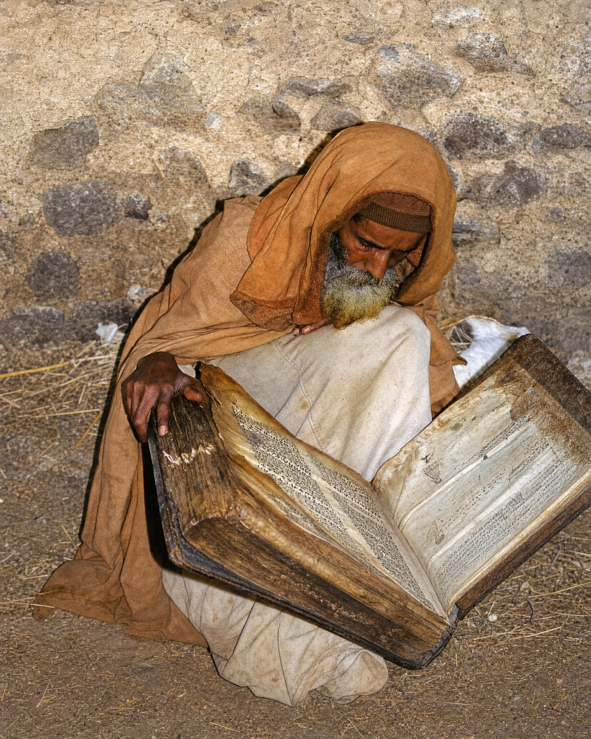 An Ethiopian monk reading an ancient manuscript